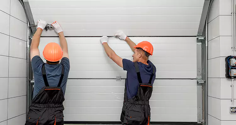 Garage Door Bottom Panel Repair in Lake Magdalene, FL